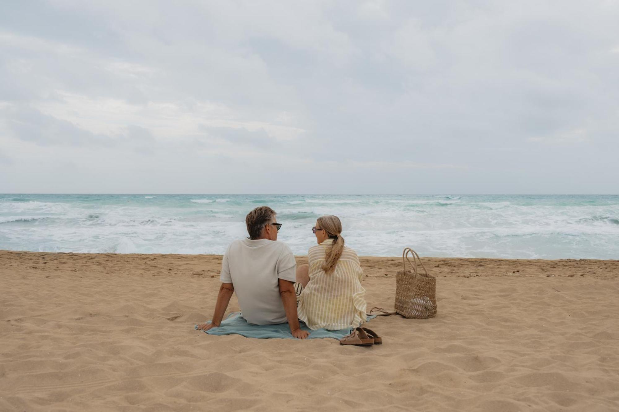 Iberostar Selection Playa De Palma Hotel Playa de Palma  Exterior photo A couple sitting on a beach